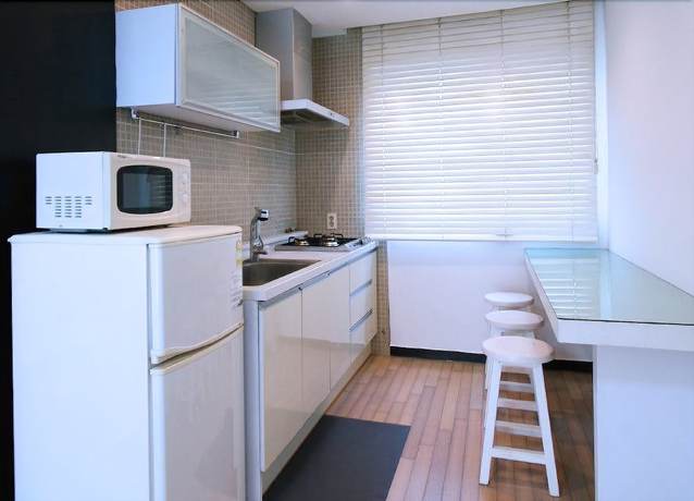 Imagen de la habitación del Pensión JM Village. Foto 11