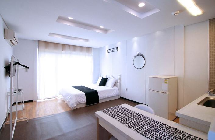 Imagen de la habitación del Pensión JM Village. Foto 13