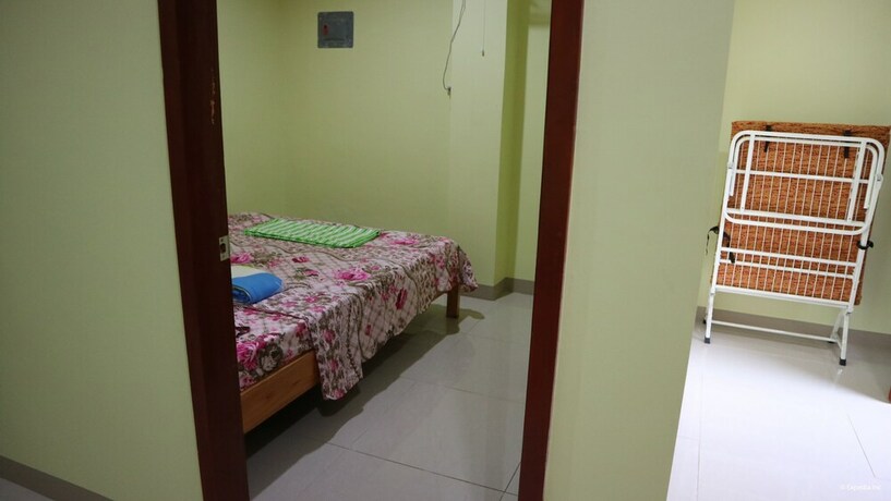 Imagen de la habitación del Pensión La Fela House. Foto 18