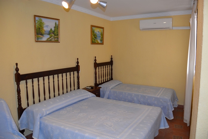 Imagen de la habitación del Pensión La Giraldilla. Foto 12