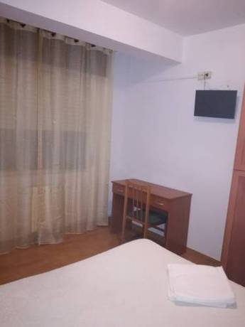 Imagen de la habitación del Pensión Los Trillizos. Foto 8