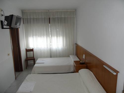 Imagen de la habitación del Pensión Los Trillizos. Foto 10