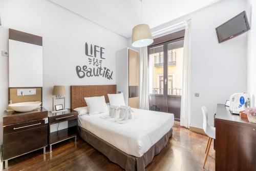 Imagen de la habitación del Pensión Madrid House Rooms. Foto 14