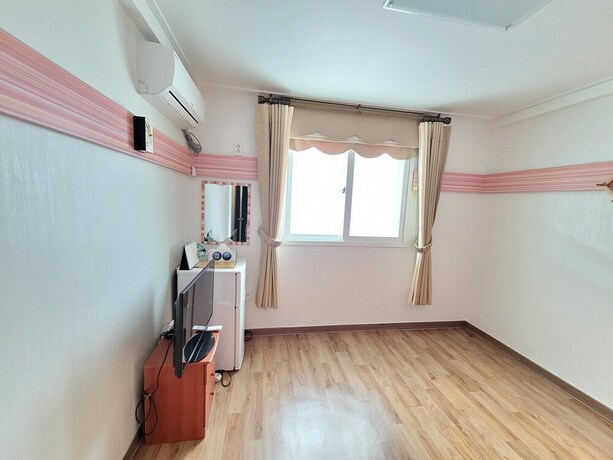Imagen de la habitación del Pensión Muju. Foto 8