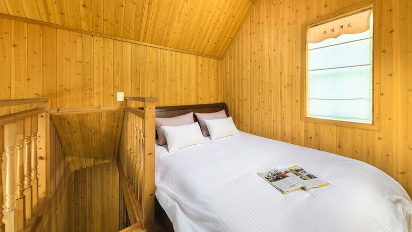 Imagen de la habitación del Pensión Muju Island. Foto 18