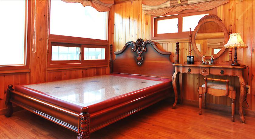 Imagen de la habitación del Pensión Muju Naos. Foto 5