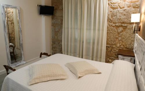 Imagen de la habitación del Pensión O Prouso. Foto 4