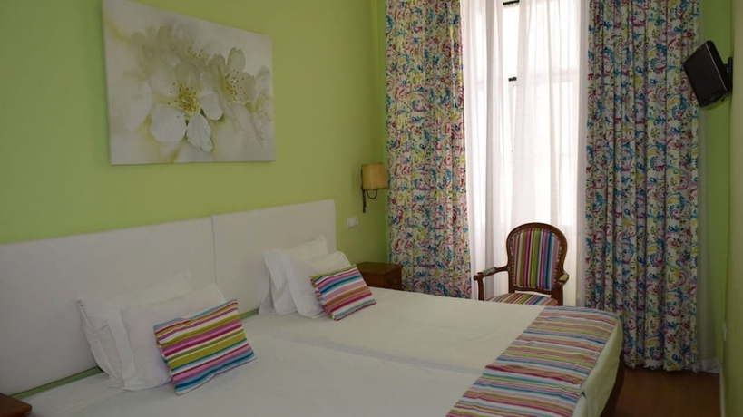 Imagen de la habitación del Pensión Pensao Flor Da Baixa. Foto 10