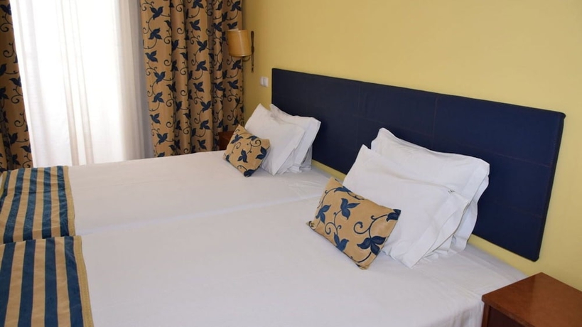 Imagen de la habitación del Pensión Pensao Flor Da Baixa. Foto 11