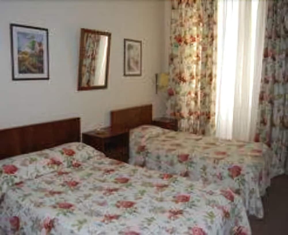 Imagen de la habitación del Pensión Pensao Flor Da Baixa. Foto 12