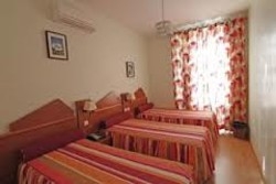 Imagen de la habitación del Pensión Pensão Praça Da Figueira. Foto 3