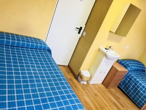 Imagen de la habitación del Pensión Pension La Estacion. Foto 6