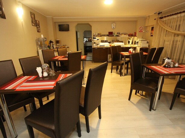 Imagen del bar/restaurante del Pensión Pension Mora Cluj Napoca. Foto 18
