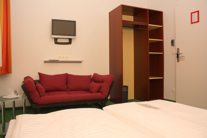 Imagen de la habitación del Pensión Pension Stadthalle. Foto 11