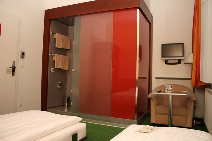 Imagen de la habitación del Pensión Pension Stadthalle. Foto 12