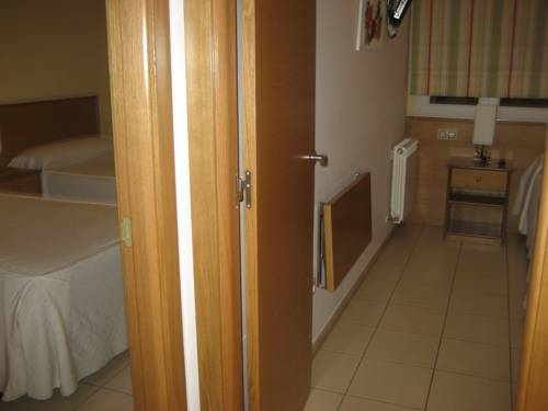 Imagen de la habitación del Pensión Residencia Caola. Foto 12