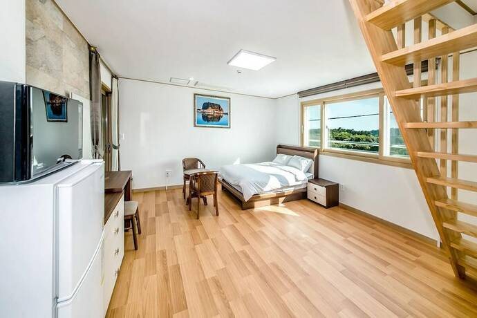 Imagen de la habitación del Pensión Seogwipo Gaetkeusi. Foto 21