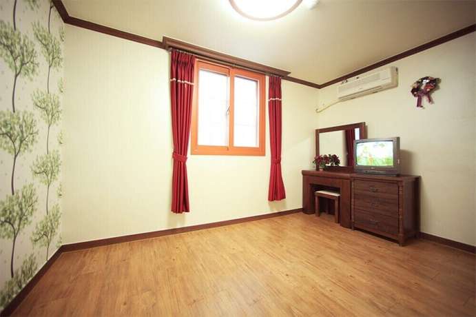 Imagen de la habitación del Pensión Shiny Town. Foto 12