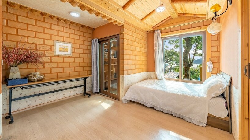 Imagen de la habitación del Pensión Tongyoung Blue House Spa. Foto 18