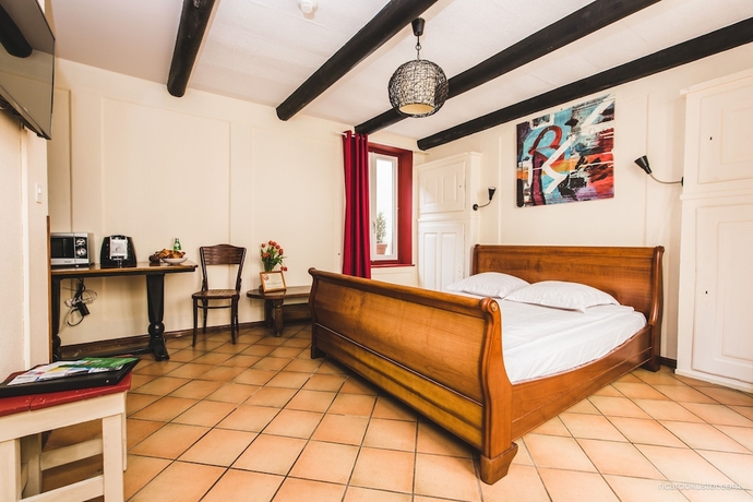 Imagen de la habitación del Pousada Aux Chambres Du Banneret. Foto 4