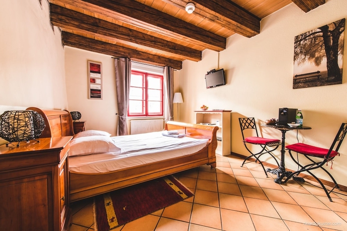Imagen de la habitación del Pousada Aux Chambres Du Banneret. Foto 9