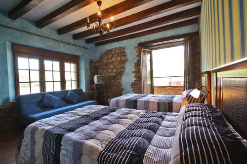 Imagen de la habitación del Pousada Medieval El Manjon. Foto 2