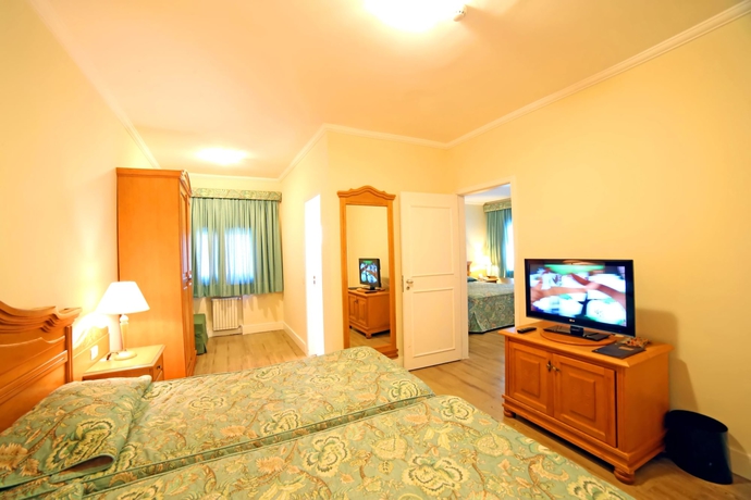 Imagen de la habitación del Pousada Pousada Villaggio Italia. Foto 10