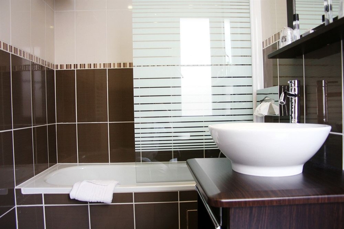 Imagen de la habitación del Residencia Boutique Hotel D'angleterre. Foto 3