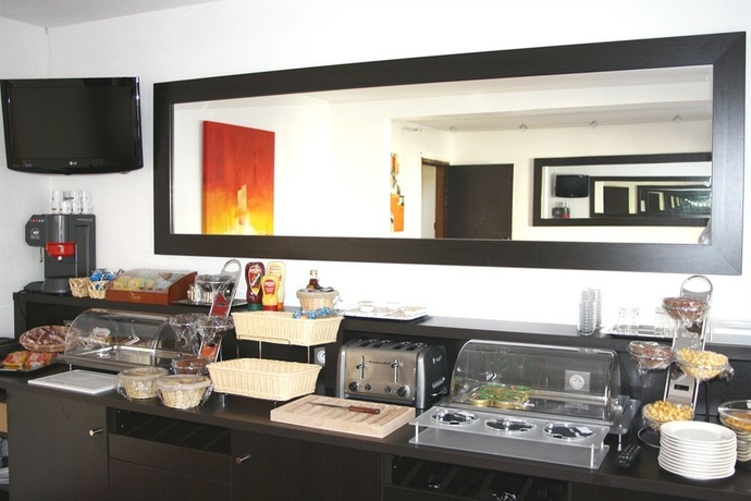 Imagen del bar/restaurante del Residencia Boutique Hotel D'angleterre. Foto 2