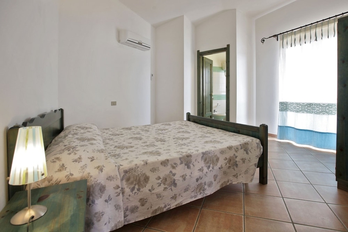 Imagen de la habitación del Residencia Club Esse Residence Capo D'orso. Foto 5