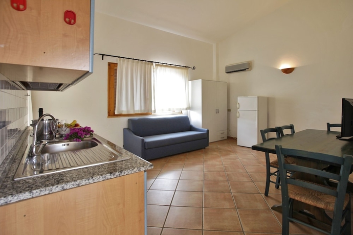 Imagen de la habitación del Residencia Club Esse Residence Capo D'orso. Foto 7