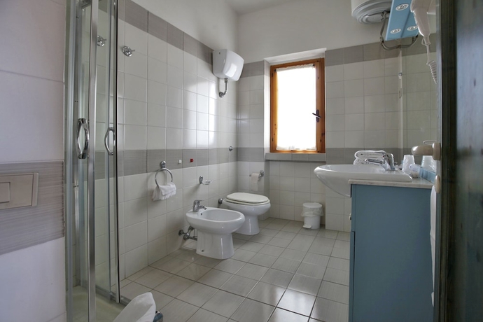 Imagen de la habitación del Residencia Club Esse Residence Capo D'orso. Foto 9