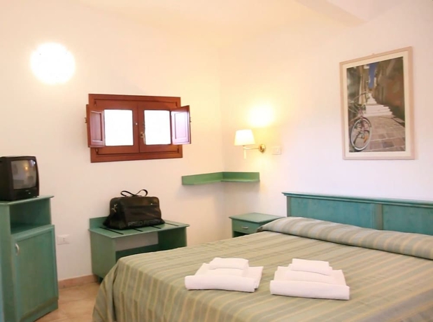 Imagen de la habitación del Residencia Club Mezzaluna. Foto 2