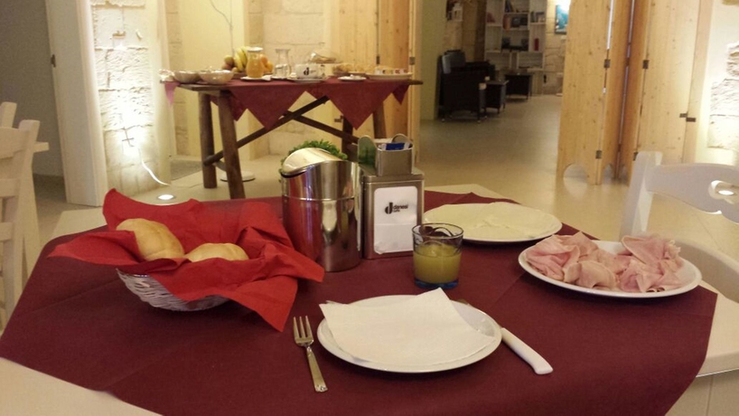 Imagen del bar/restaurante del Residencia Dimora Vicolo Corto. Foto 3