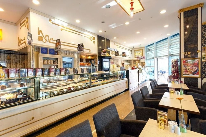 Imagen del bar/restaurante del Residencia Flora Suites, Ataşehir. Foto 2