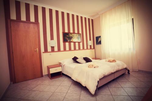 Imagen de la habitación del Residencia Fonte Di Bagnaria Residence. Foto 6