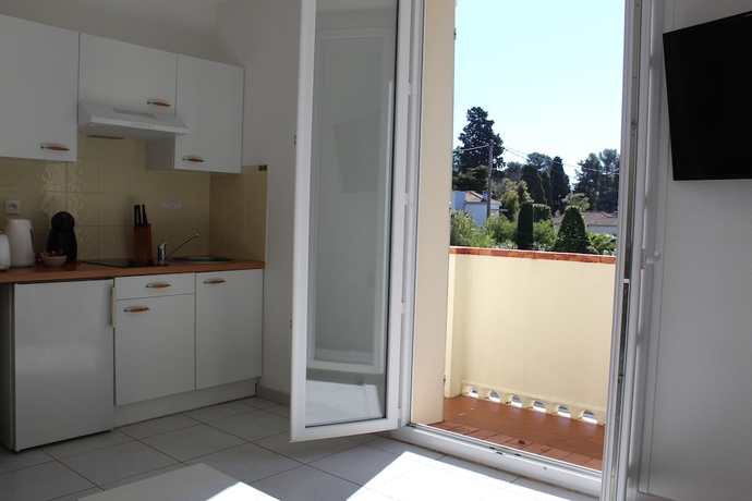 Imagen de la habitación del Residencia Kimi Résidence. Foto 17