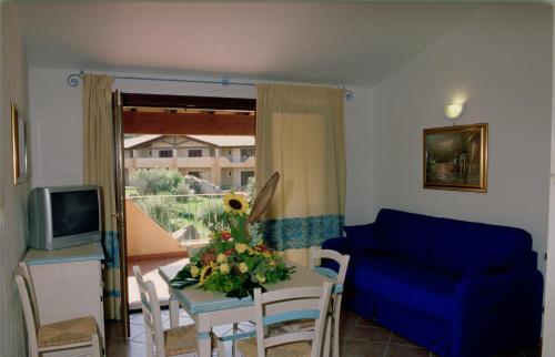 Imagen de la habitación del Residencia Le Corti di Marinella. Foto 12
