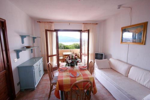 Imagen de la habitación del Residencia Le Corti di Marinella. Foto 15