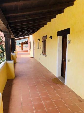 Imagen de la habitación del Residencia Le Corti di Marinella. Foto 16