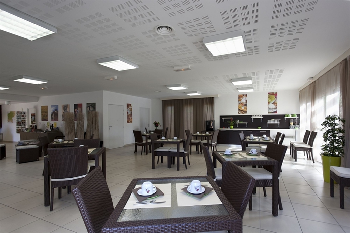 Imagen del bar/restaurante del Residencia Les Hameaux de Montreal. Foto 4