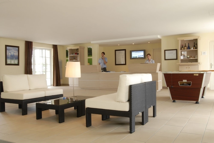 Imagen de los interiores del Residencia Pierre and Vacances Residence Le Green Beach. Foto 17