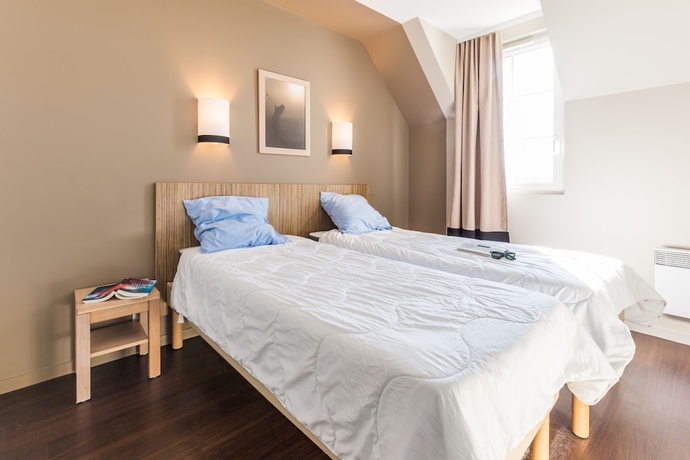 Imagen de la habitación del Residencia Pierre and Vacances Residence Le Green Beach. Foto 13