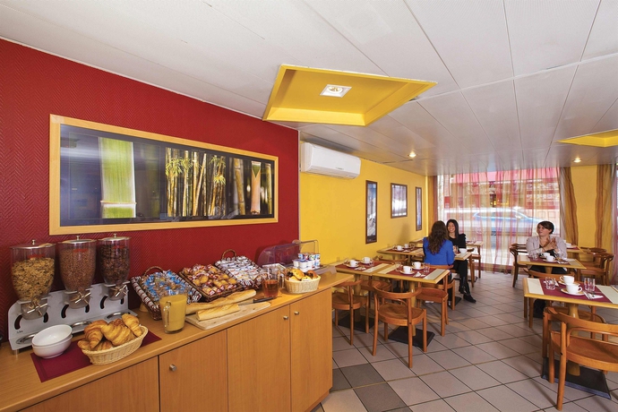 Imagen del bar/restaurante del Residencia Séjours Et Affaires Saxe Gambetta - Lyon. Foto 5