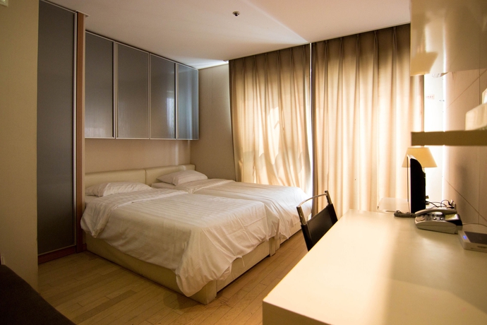 Imagen de la habitación del Residencia Sinchon Casaville Residence. Foto 7