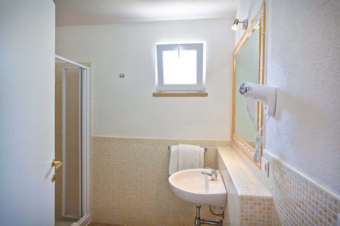 Imagen de la habitación del Residencia Stella Di Gallura. Foto 4