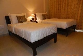 Imagen de la habitación del Residencia Tavisha Villa, Noida. Foto 16