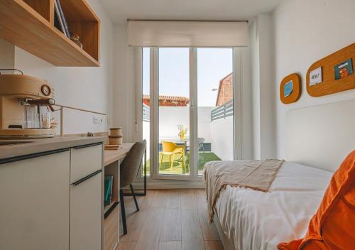 Imagen de la habitación del Residencia VIBE Stay Granada. Foto 18