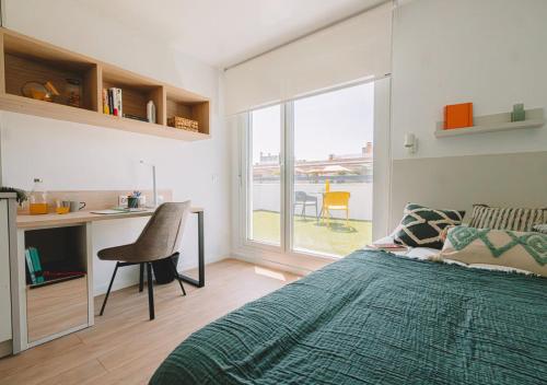 Imagen de la habitación del Residencia VIBE Stay Granada. Foto 20