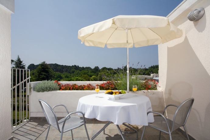 Imagen de la habitación del Residencia Valamar Diamant Residence. Foto 9